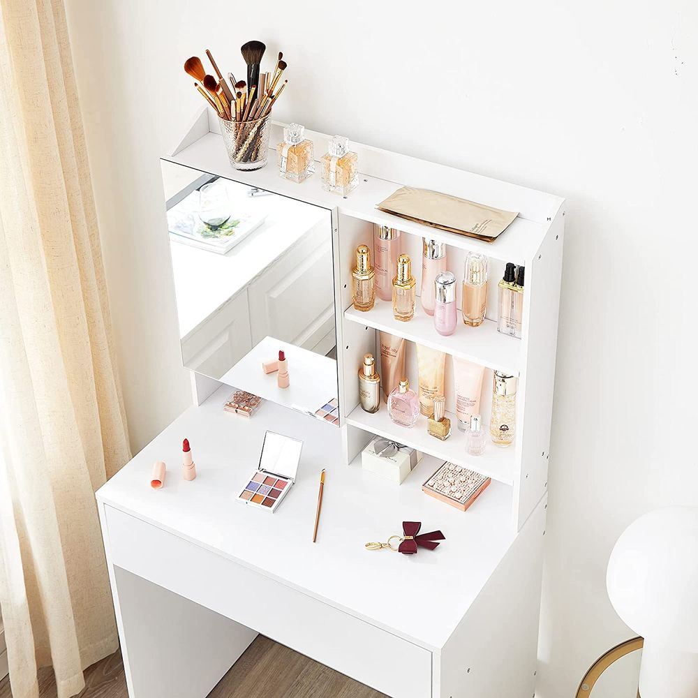 Minimalist white dressing table featuring a hidden storage shelf behind the mirror, an open compartment for perfumes, a spacious drawer, and a top shelf for personalized décor. Crafted from high-quality chipboard, it is both elegant and durable, perfect for modern spaces.