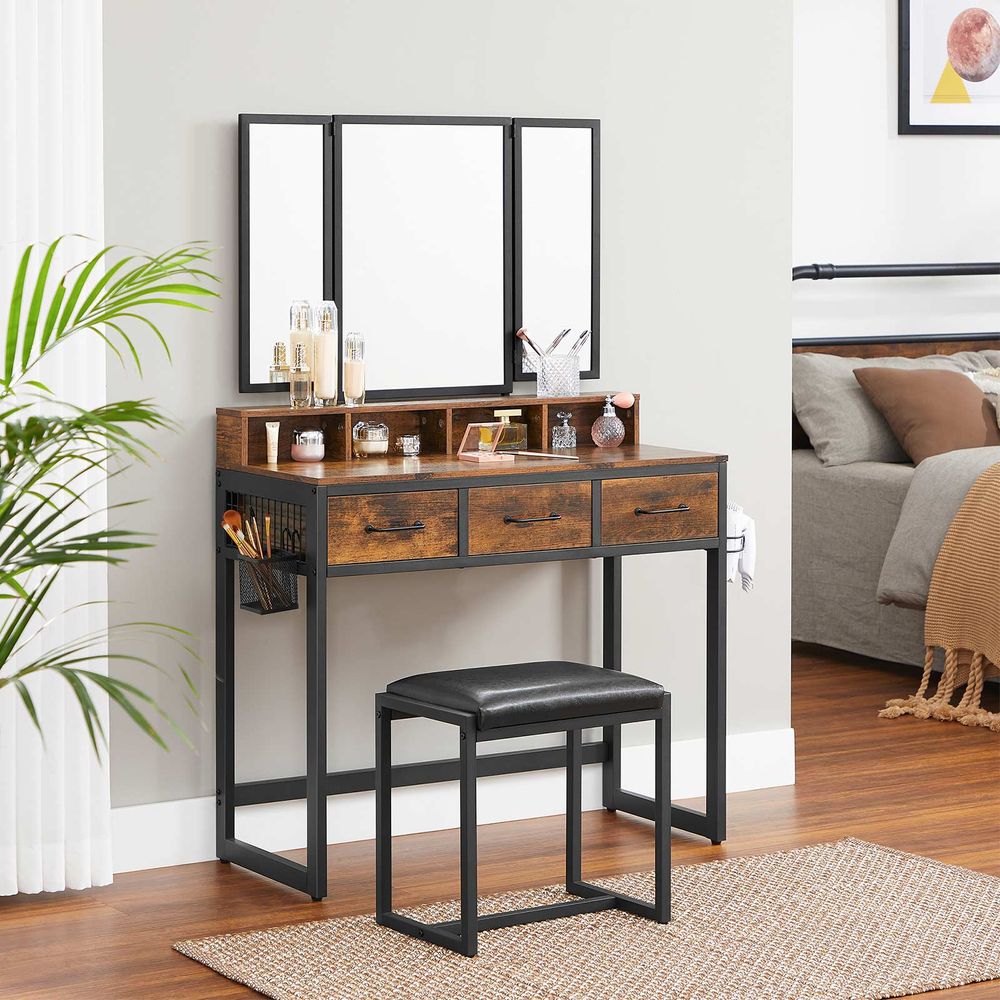 Elegant dressing table set with a tri-fold mirror, three spacious drawers, and a padded stool. Available in Brown, Oak Brown, Gray, and White, with a sturdy steel frame and ample storage options.