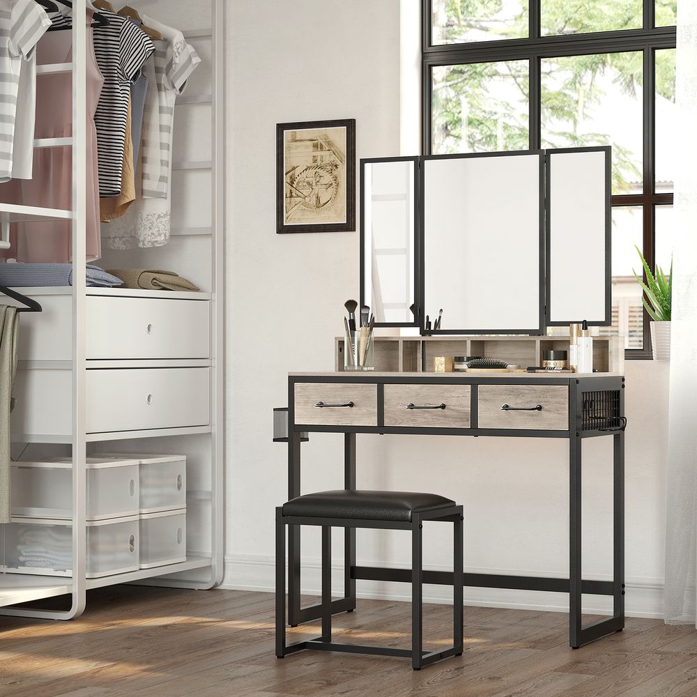 Elegant dressing table set with a tri-fold mirror, three spacious drawers, and a padded stool. Available in Brown, Oak Brown, Gray, and White, with a sturdy steel frame and ample storage options.