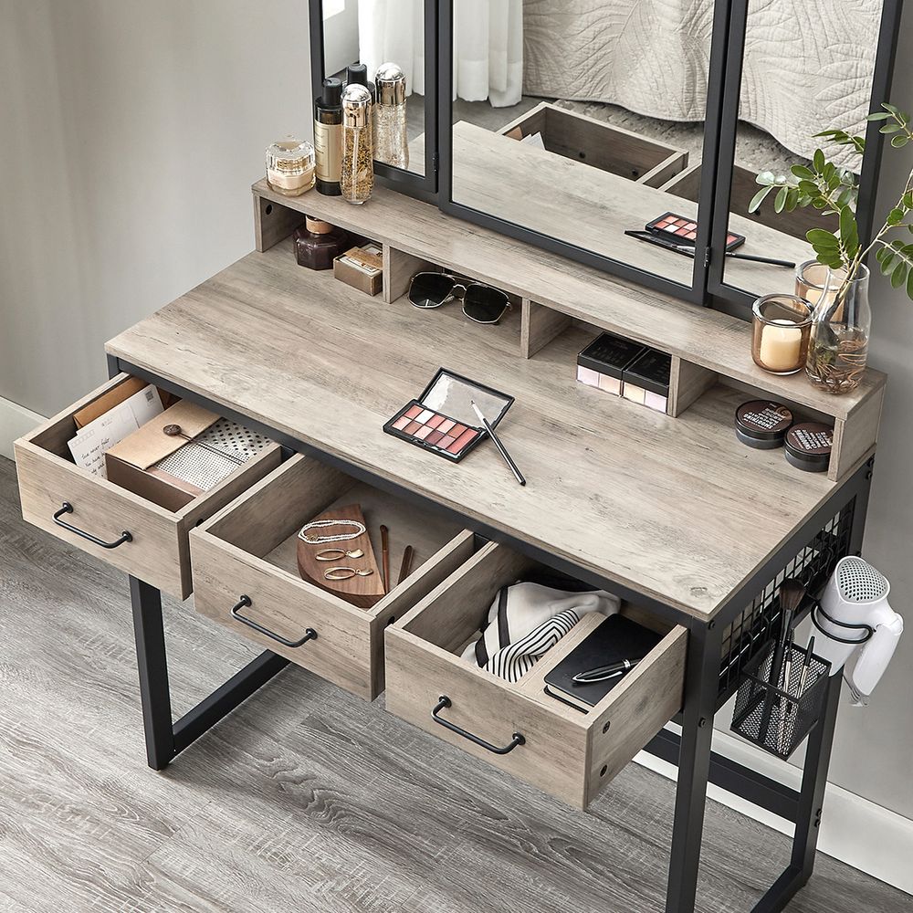 Elegant dressing table set with a tri-fold mirror, three spacious drawers, and a padded stool. Available in Brown, Oak Brown, Gray, and White, with a sturdy steel frame and ample storage options.