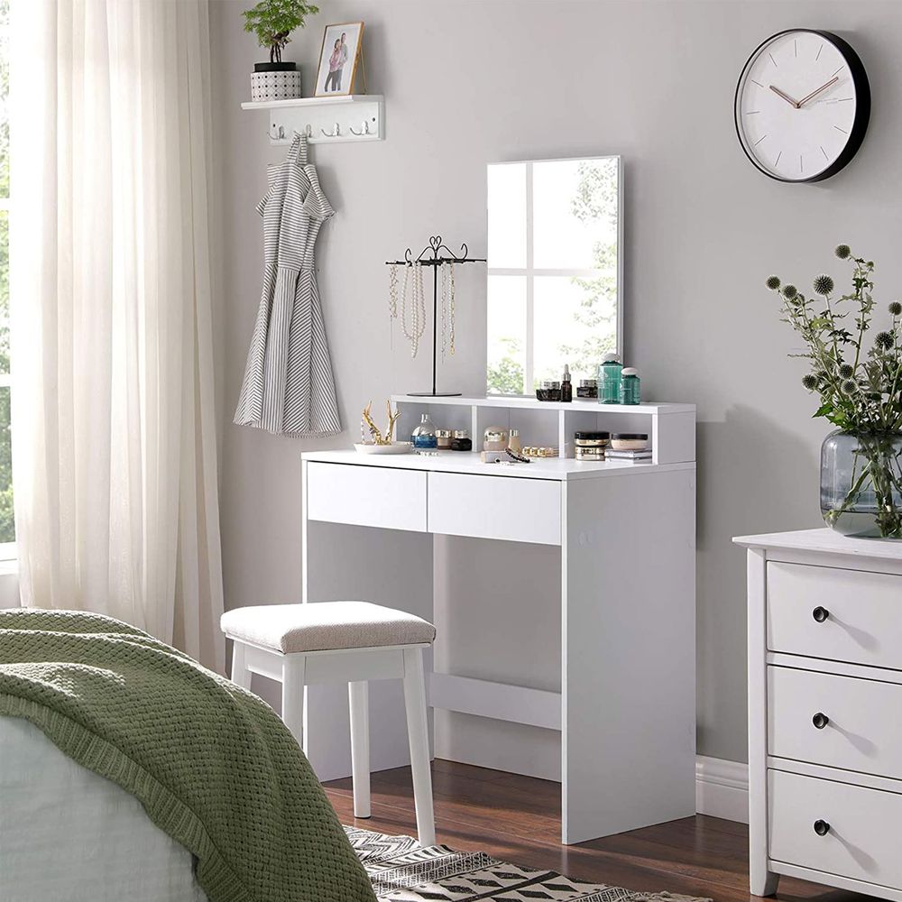 Elegant white dressing table with a rectangular mirror, 2 large drawers for makeup storage, 3 open compartments for nail polish and cosmetics, and a raised shelf for perfume bottles. The table features a modern design with melamine coating for easy cleaning and includes anti-tip protection for safety. Ideal for organizing your beauty essentials.