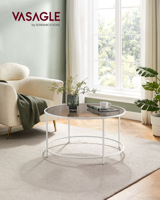 VASAGLE Modern Glass Coffee Table with a sleek pearl white frame, durable tempered glass top, and minimalist round design, offering stability, elegance, and functionality for any modern living room.







