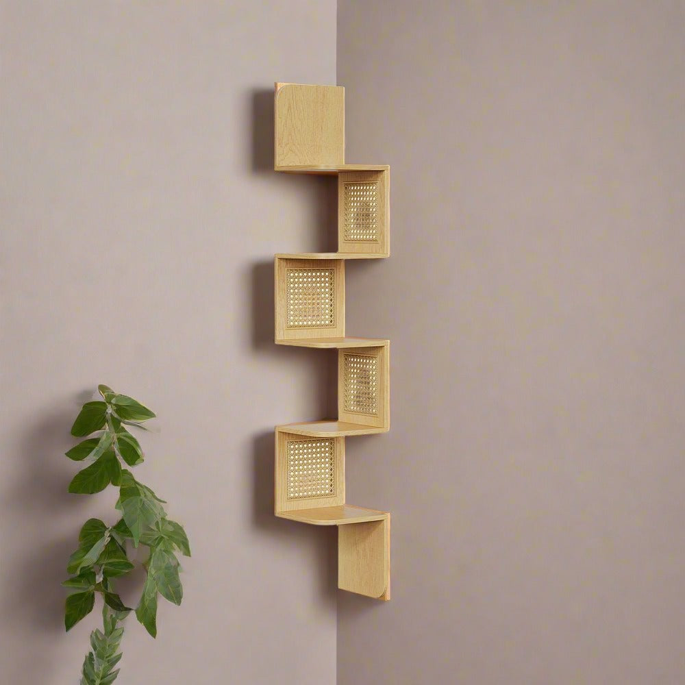 Boho Chic Corner Wall Shelf with PVC Rattan Panels in Oak Beige, showcasing a unique zigzag design and earthy tones, ideal for books, plants, and decor in any room.