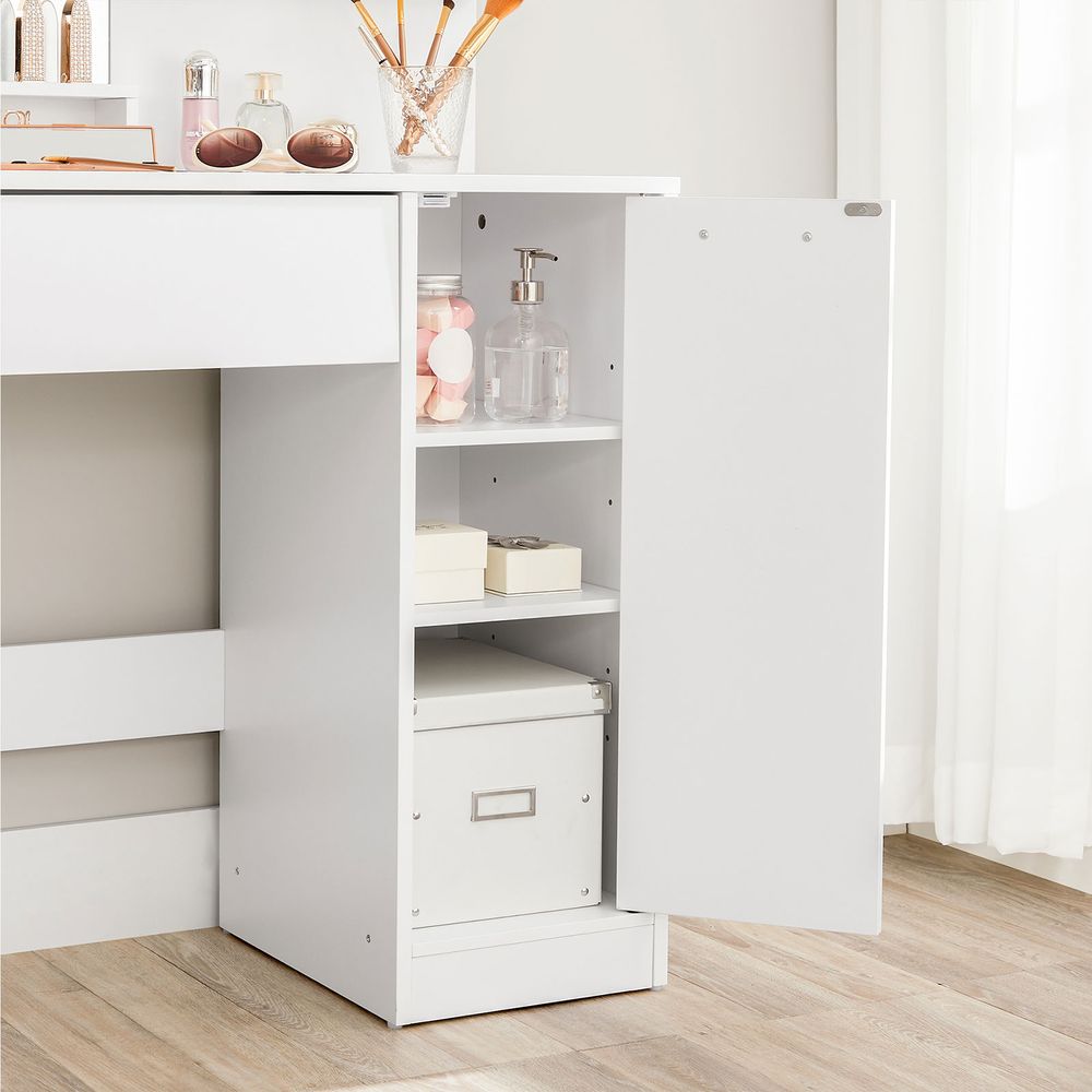 Elegant white dressing table with a frameless mirror, shelves for lipsticks and creams, a drawer for eye shadows and brushes, and a cupboard for skincare products. The sleek design and smooth lacquer coating make it a timeless addition to any room.







