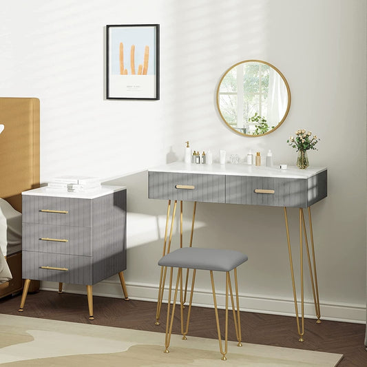 "Chic vanity makeup table with gold metal legs, adjustable mirror, and velvet-padded stool, featuring three drawers and a high-gloss finish – Egyptian Queen Store."

