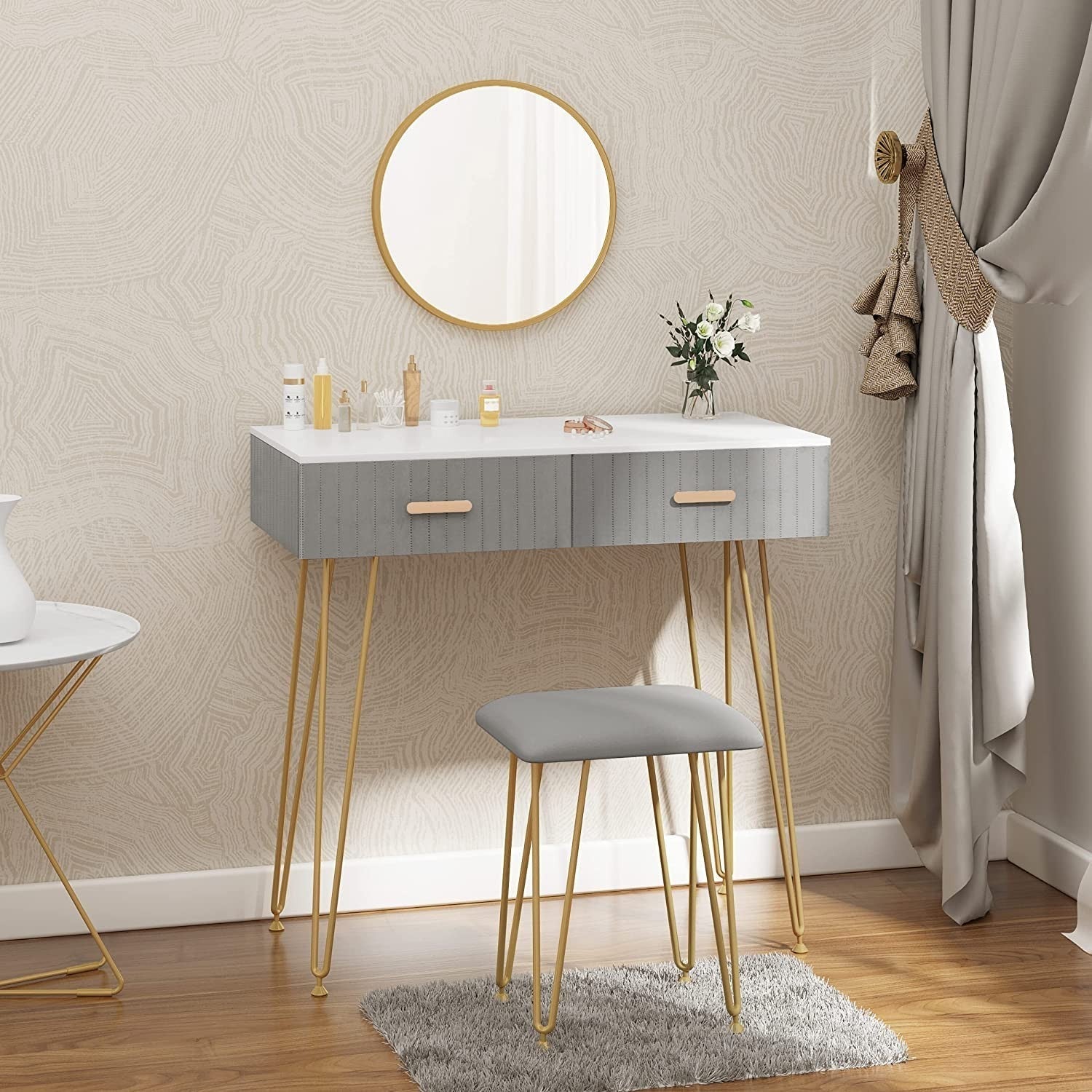 "Chic vanity makeup table with gold metal legs, adjustable mirror, and velvet-padded stool, featuring three drawers and a high-gloss finish – Egyptian Queen Store."

