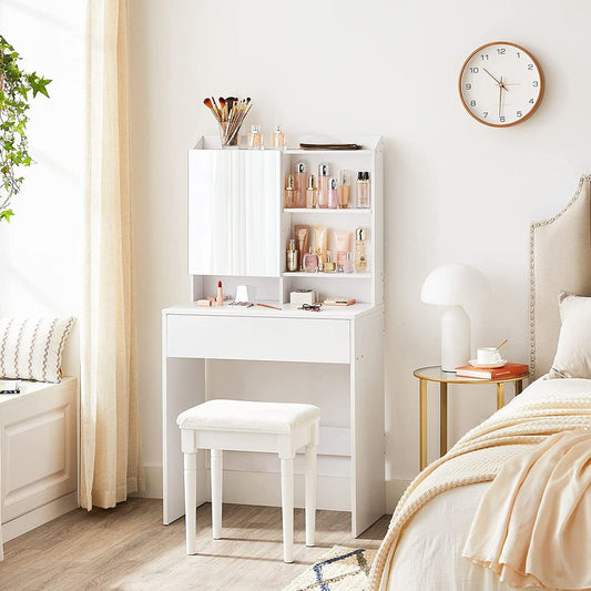 Minimalist white dressing table featuring a hidden storage shelf behind the mirror, an open compartment for perfumes, a spacious drawer, and a top shelf for personalized décor. Crafted from high-quality chipboard, it is both elegant and durable, perfect for modern spaces.






