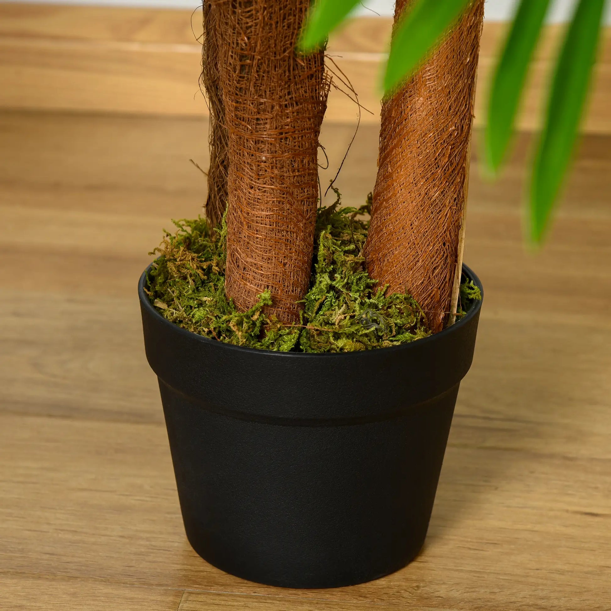 120 cm artificial palm tree with 19 realistic green leaves and a sturdy pot, ideal for bringing a tropical feel to indoor or outdoor spaces. No watering or pruning needed.


