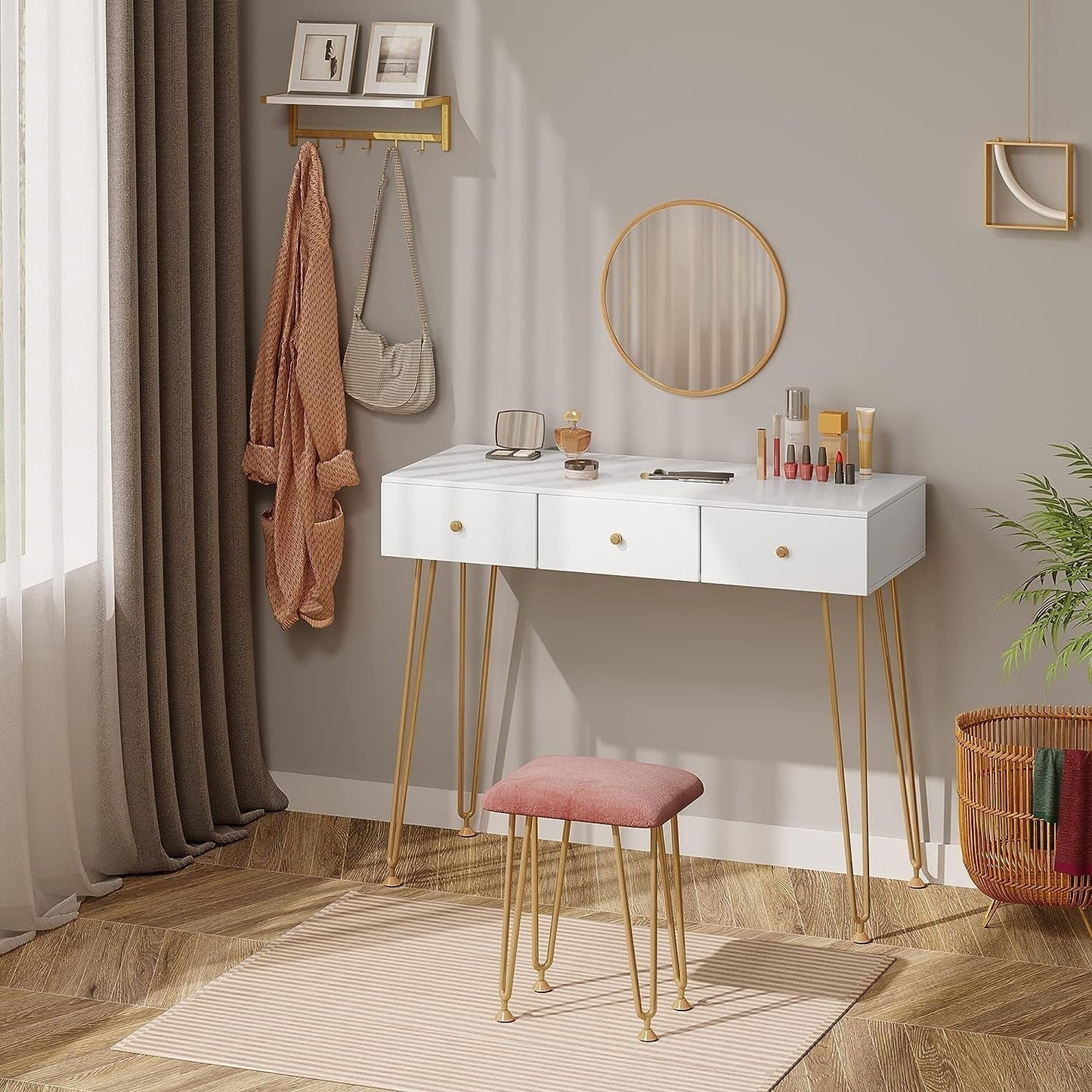 "Golden Elegance vanity makeup table with gold metal frame, spacious white drawers, velvet-padded stool, and a round wall-mounted mirror for modern interiors."

