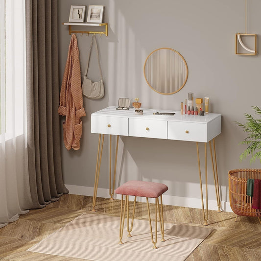 "Golden Elegance vanity makeup table with gold metal frame, spacious white drawers, velvet-padded stool, and a round wall-mounted mirror for modern interiors."

