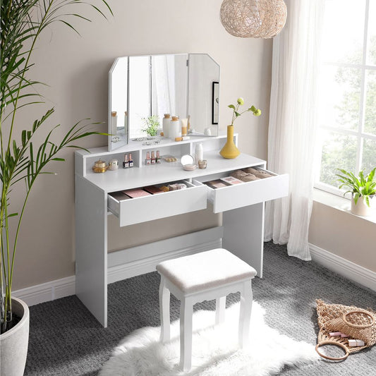Classy white makeup dresser featuring a tri-fold mirror, two large drawers for cosmetics, three open compartments for nail polish, and a raised shelf for perfumes. Made with stain-resistant chipboard and melamine coating for durability and easy maintenance.