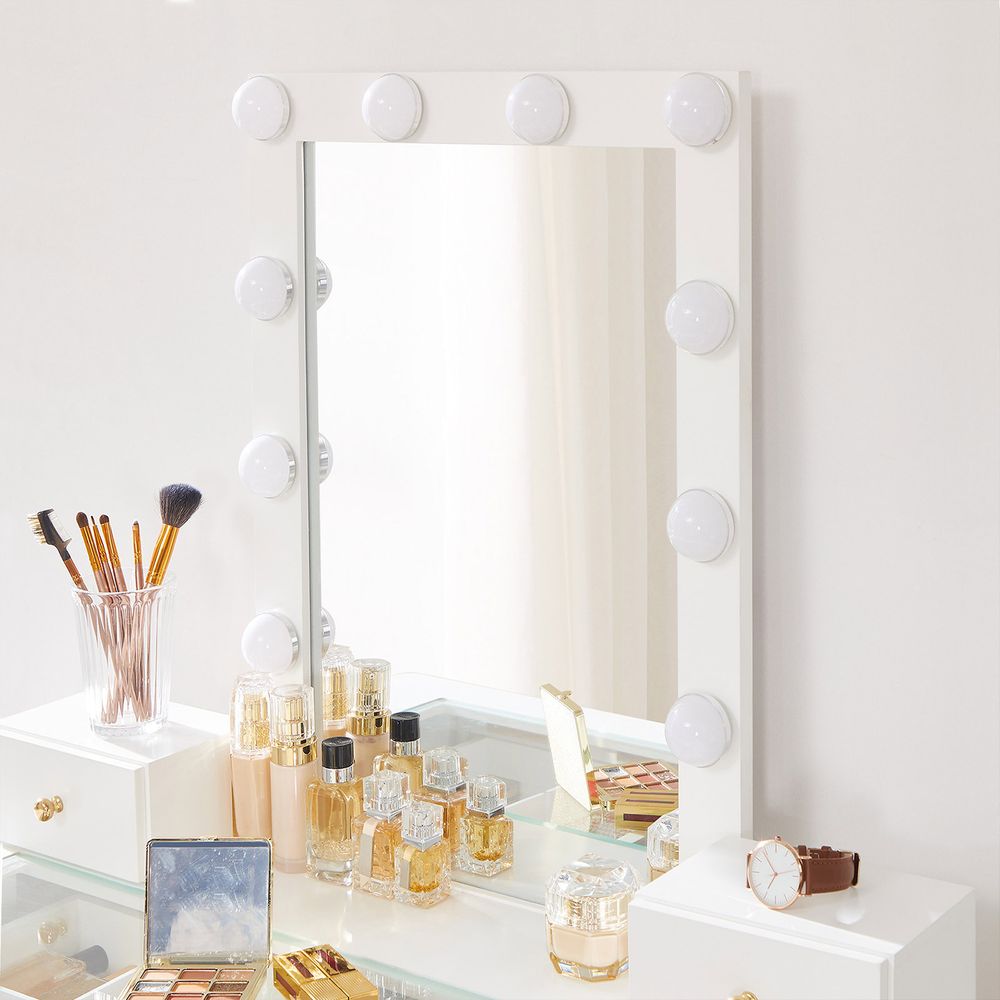Elegant white dressing table with a large mirror, 10 light bulbs, and 2 storage drawers. Comes with an upholstered stool for added comfort, perfect for organizing cosmetics and creating a stylish beauty space. Durable MDF and solid wood construction.